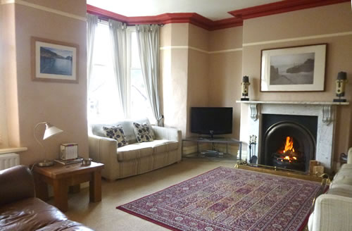 Relaxing lounge with open fireplace